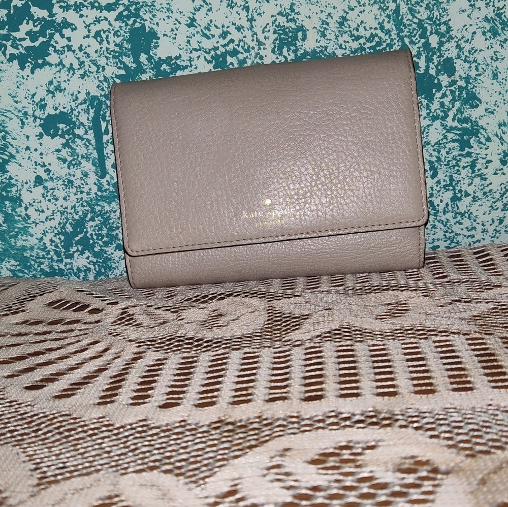 Authentic Kate Spade  wallet taupe color. Leather.
